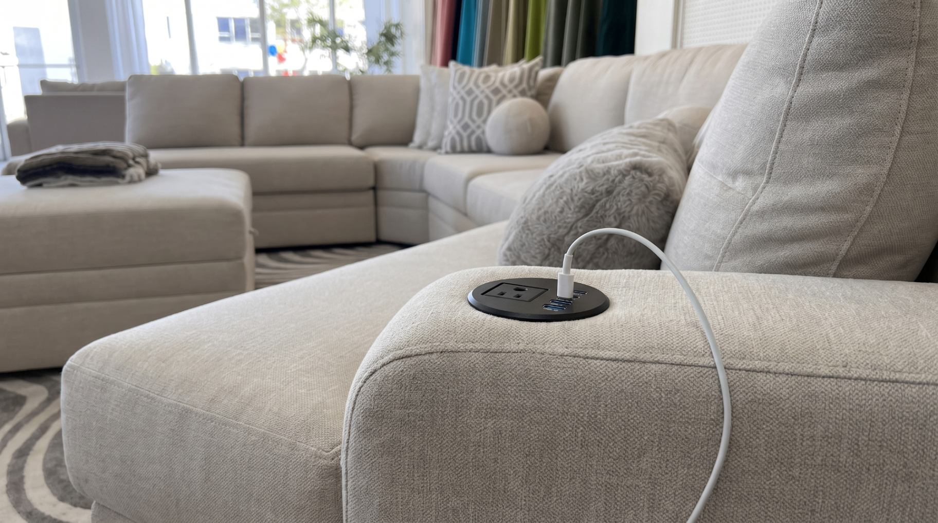 Sectional arm with built-in USB charging ports and outlet
