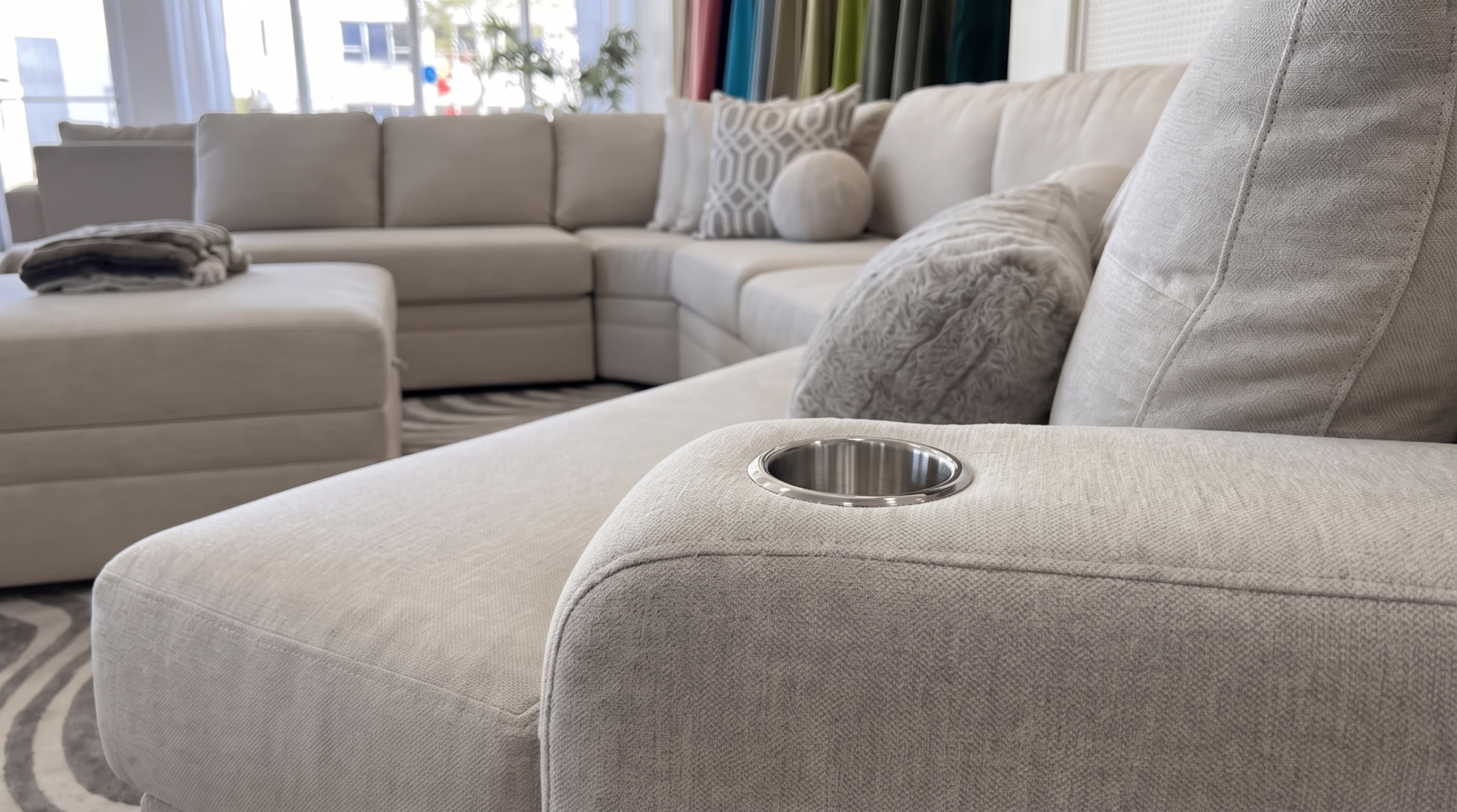 Sectional arm with built-in stainless steel cup holder